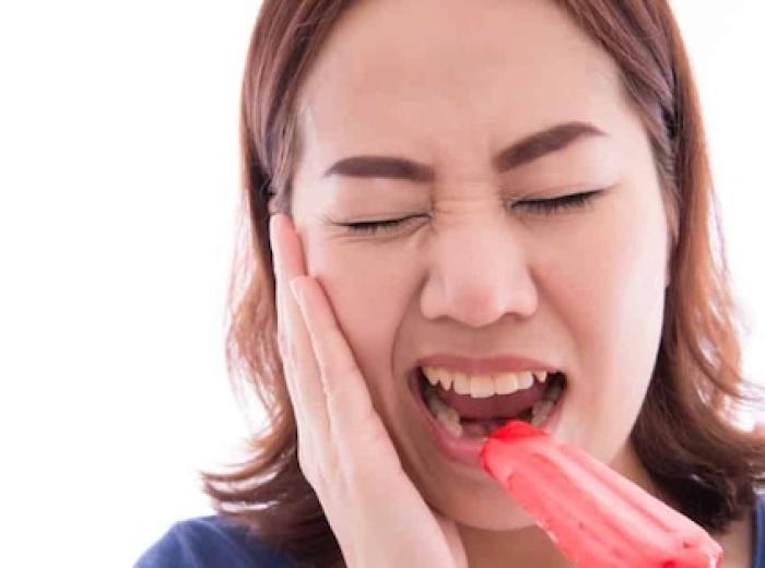 What Causes Tooth Sensitivity and How to Treat It